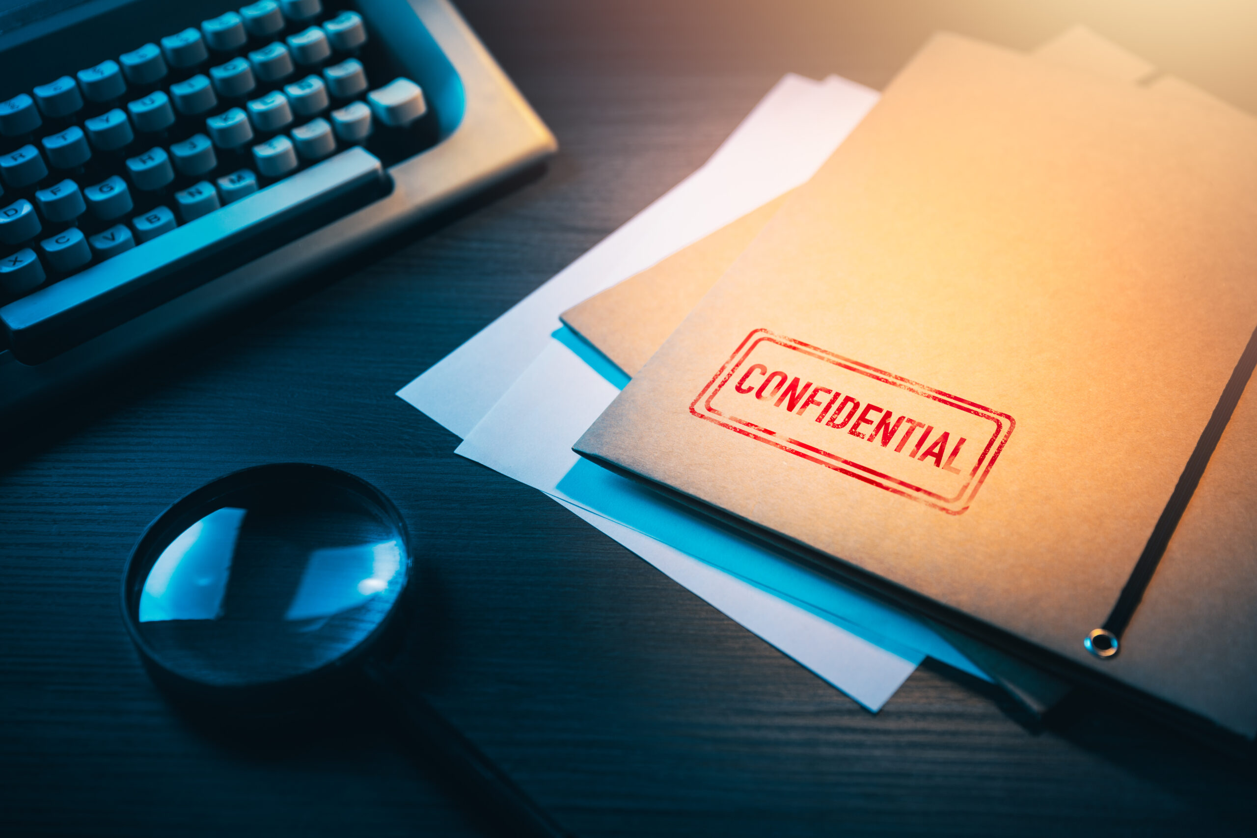 Private investigator desk with confidential envelopes